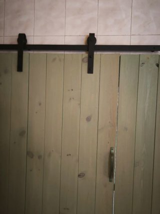 Puerta corredera de madera