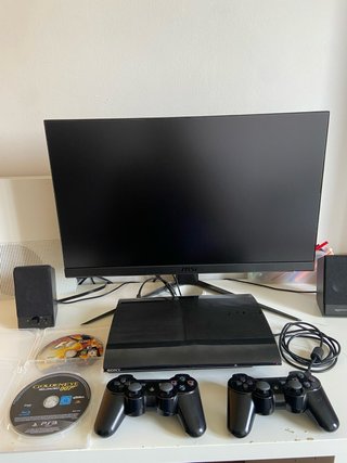 PS3 Ultra Slim 12GB + 2 Mandos y 2 Juegos