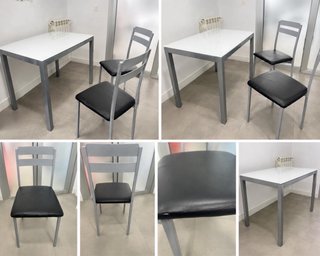 Mesa de cocina de cristal y metal con 2 sillas