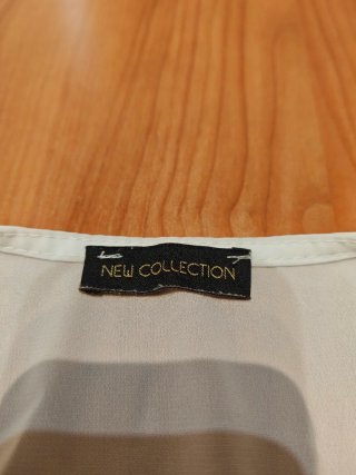 Blusa blanca cruzada manga larga