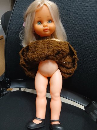 Muñeca antigua rubia ojos azules
