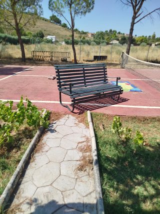 Banco de jardín de hierro forjado