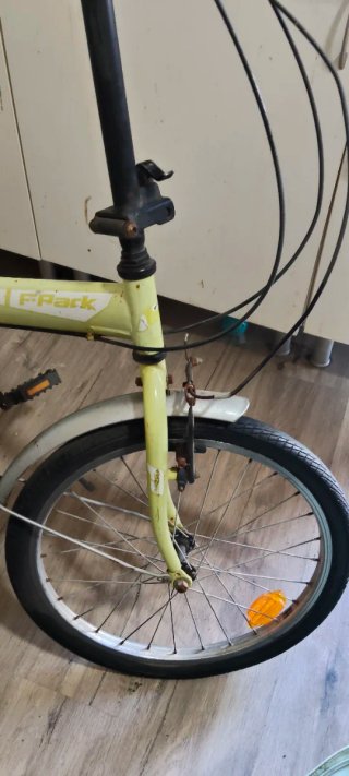Bicicleta plegable amarilla F-Pack. Muy fiable.