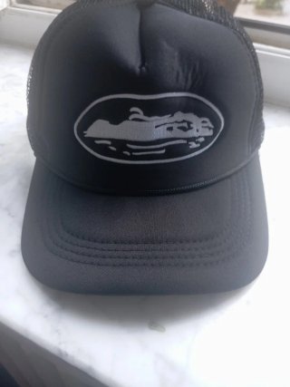 Cappellino uomo nero con logo ovale