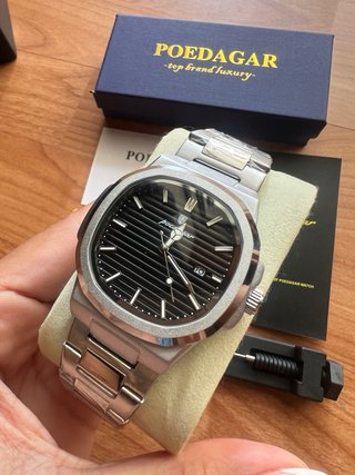 Reloj Poedagar Nautilus nuevo.