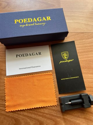Reloj Poedagar Nautilus nuevo.