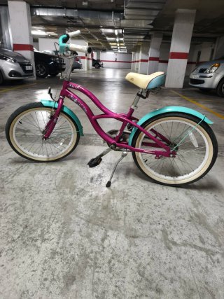 Bicicleta infantil rosa y turquesa