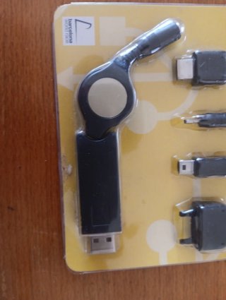 Cargador Móvil USB Retráctil + 4 Adaptadores