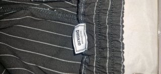 Pantalones negros de vestir a rayas