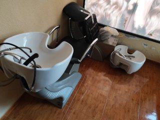 Lavabo de peluquería con silla