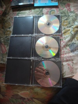 CDs Adele y Hombres G