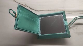 Bolso fiesta Bimba y Lola verde y dorado