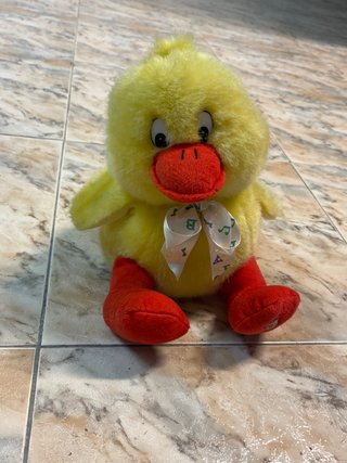 Pollito de peluche con sonido