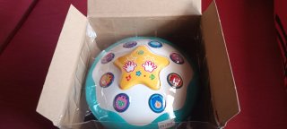 Juguete musical y luces para bebés