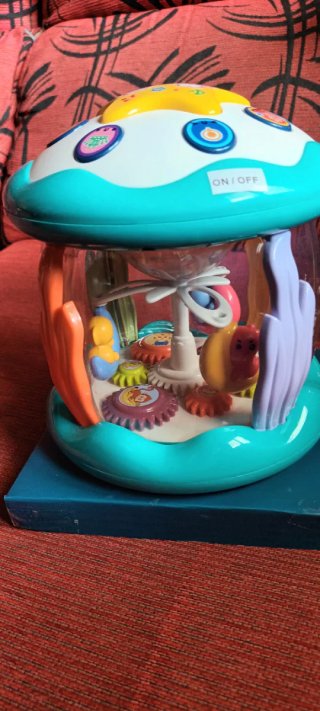 Juguete musical y luces para bebés