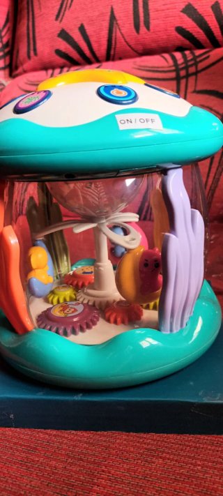 Juguete musical y luces para bebés