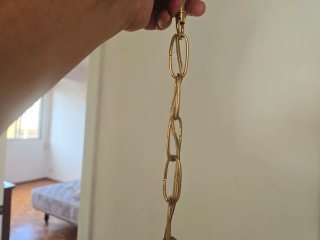 Lámpara de araña dorada y cristal