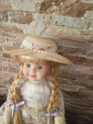 4Muñecas de Porcelana Vestida