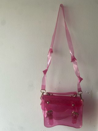 Bolso transparente rosa con brillo