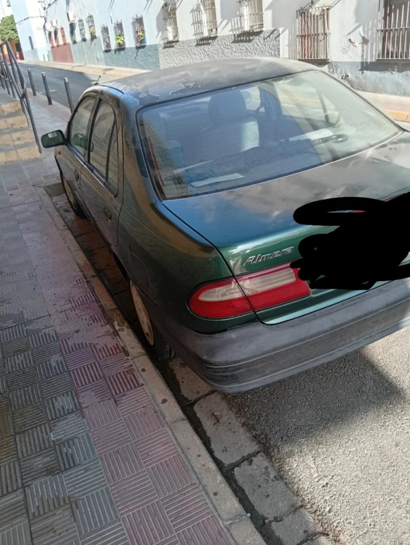 Nissan Almera 1999 - foto 1