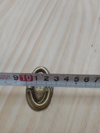 Tiradores antiguos de bronce para muebles