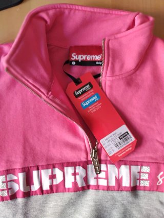 Sudadera Supreme gris y rosa
