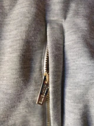 Sudadera Supreme gris y rosa