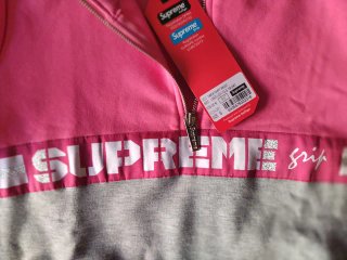 Sudadera Supreme gris y rosa