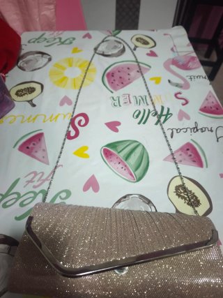 Bolso de fiesta dorado y plateado