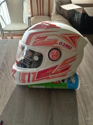 Casco de moto blanco y rosa. Talla M.