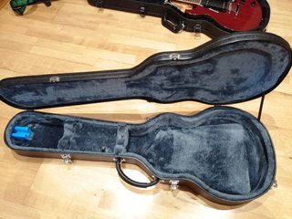Cambio estuche guitarra eléctrica genérico