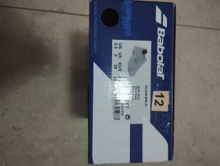 Zapatillas Babolat blancas y rosas