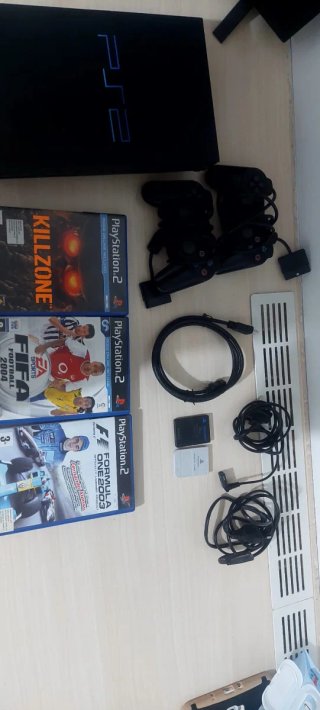 Consola PlayStation 2 + 3 Juegos