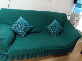 Sofá de tela azul y gris