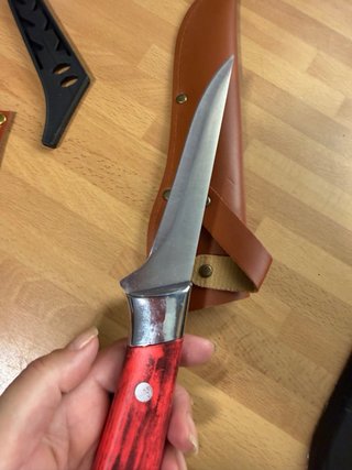 Juego de cuchillos con fundas de cuero