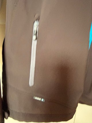 Chaqueta Ternua Negra y Turquesa de Mujer