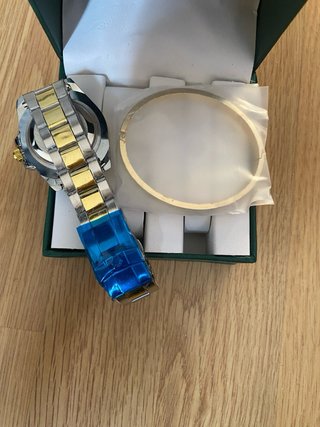 Reloj Role Oro y Plata