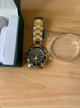Reloj Role Oro y Plata