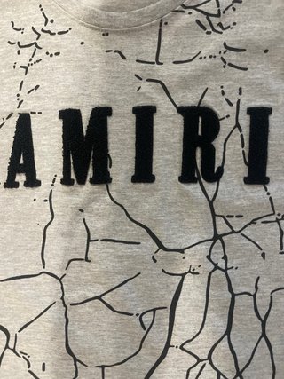 Tuta Amiri grigia con stampa
