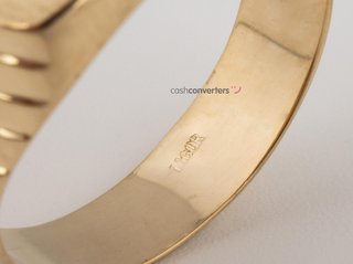 sello oro 18k