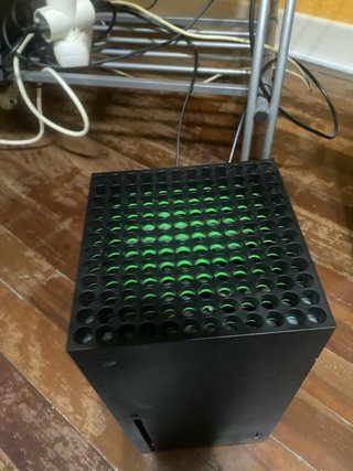 Xbox Series X Negra Preferible en persona