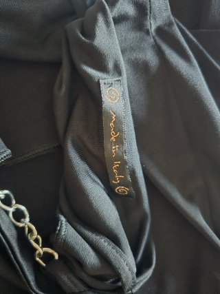 Abito elegante con catene