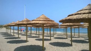 Ombrelloni di paglia per la spiaggia