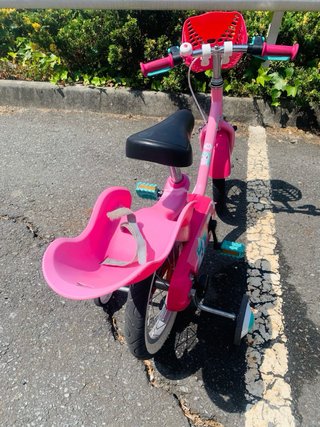 Bicicleta rosa Btwin 3-5 años con rodines