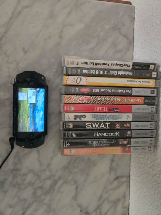 PSP 1003 con juegos y pelis
