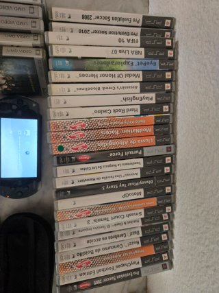 PSP 1003 Negra + 25 Juegos y 8 Pelis UMD