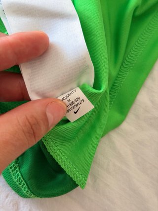 Camiseta deportiva Nike verde hombre