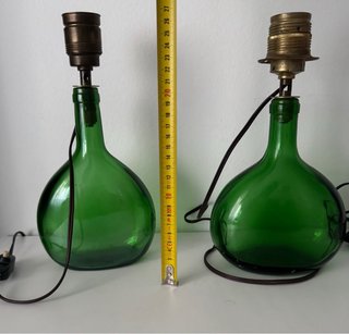 Vecchie lampade damigiana verde