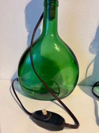 Vecchie lampade damigiana verde