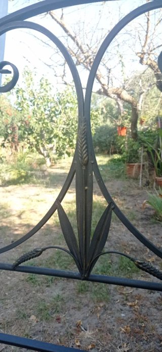 Letto baldacchino artigianale in ferro battuto